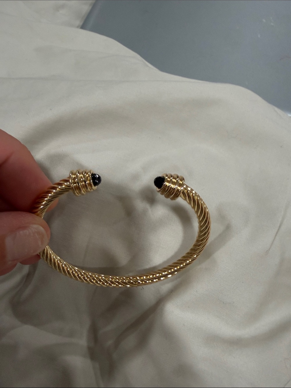 Twisted Gold Open Cuff Bracelet with Black Stone Ends